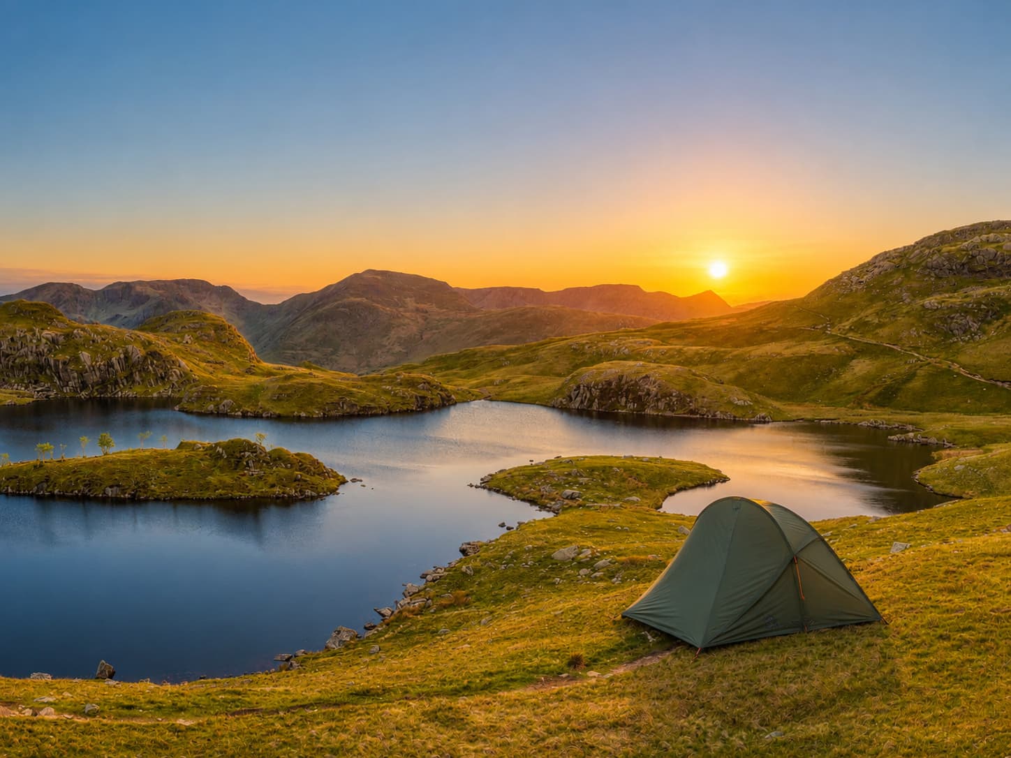 Angle Tarn near Patterdale, a classic Lake District wild camping spot with islands and sheltered bays