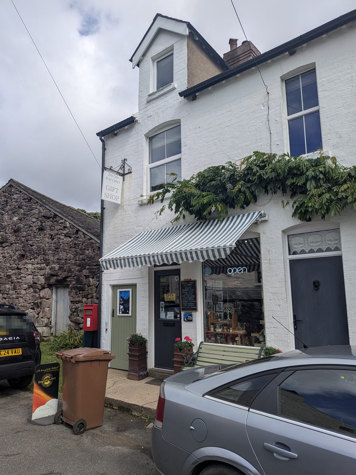 The Old Post Office in Boot, the village shop and gift shop, with the post box outside