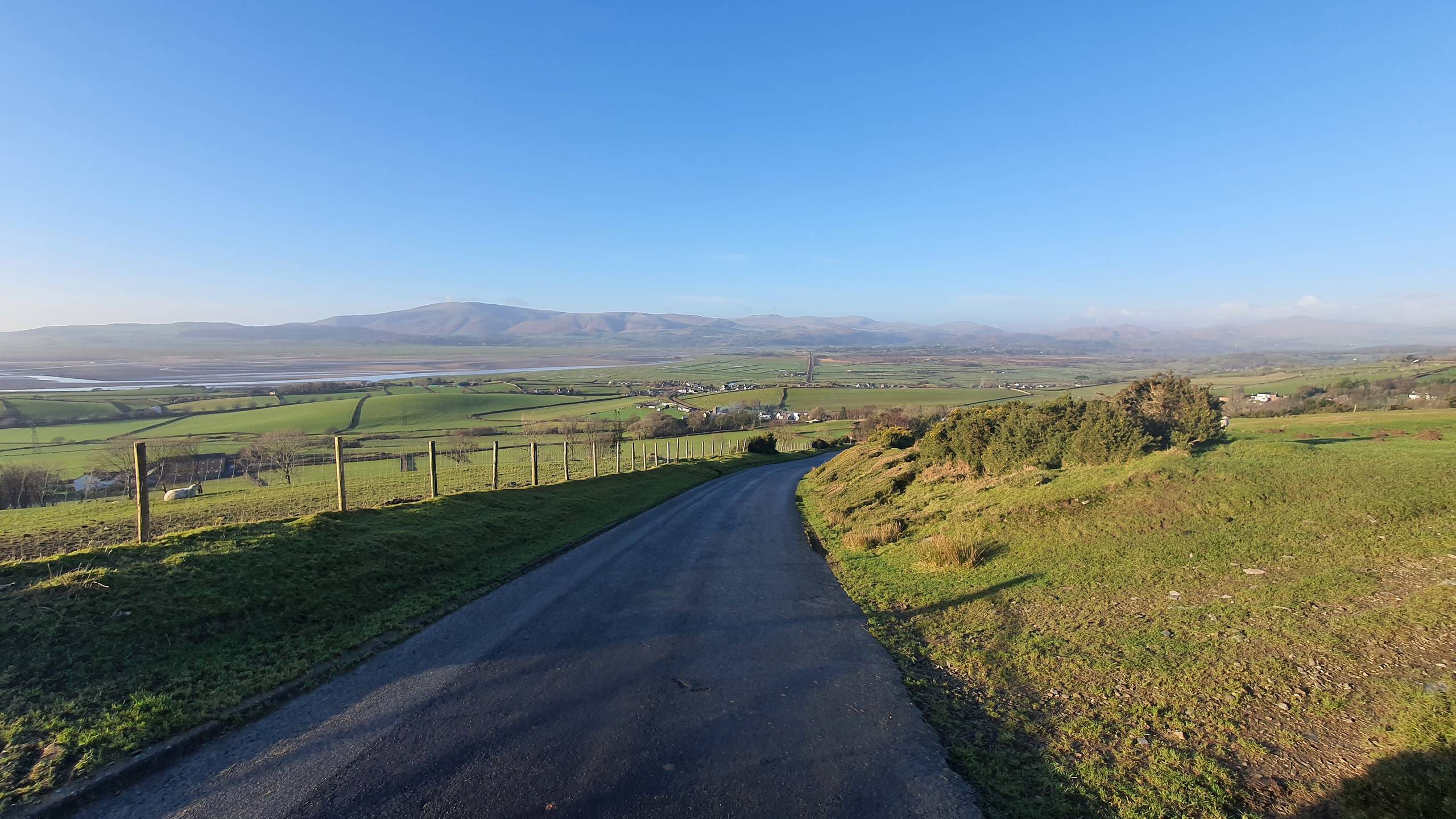 The Duddon estuary and Black Combe seen from the A595 coast road, the year-round approach to Muncaster Castle and Ravenglass