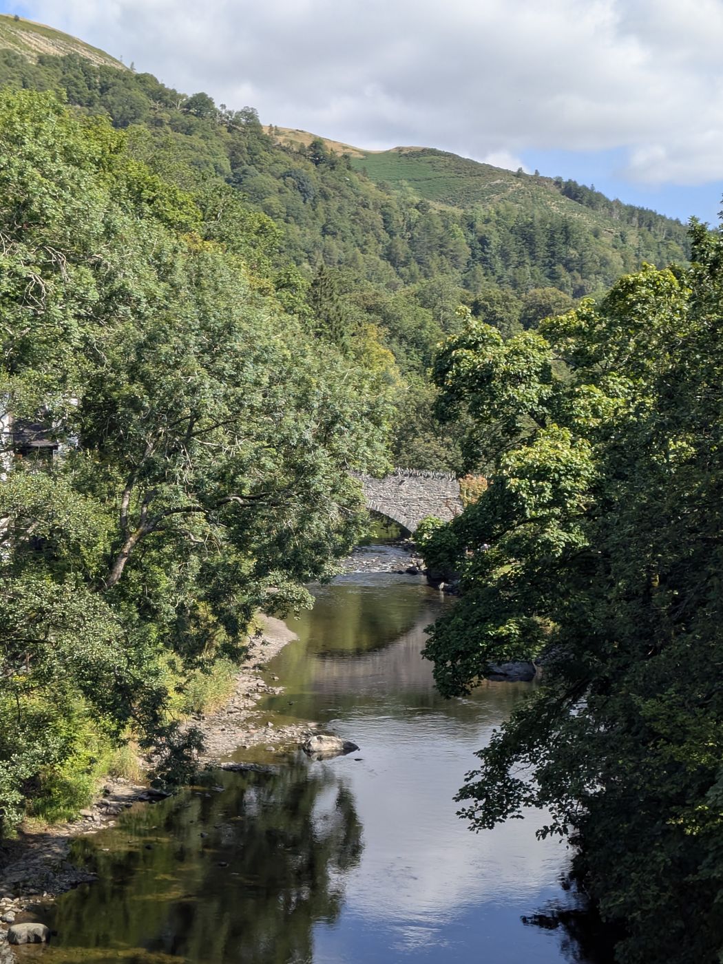 Stone bridge over the River Greta seen from the Keswick to Threlkeld Railway Trail