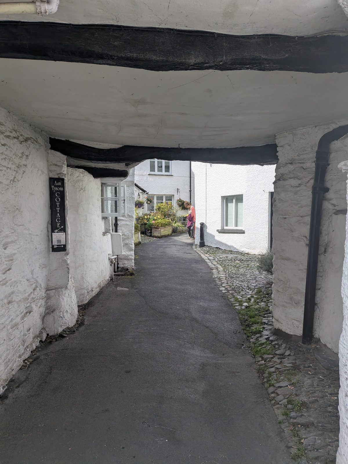 A whitewashed alley in Hawkshead village