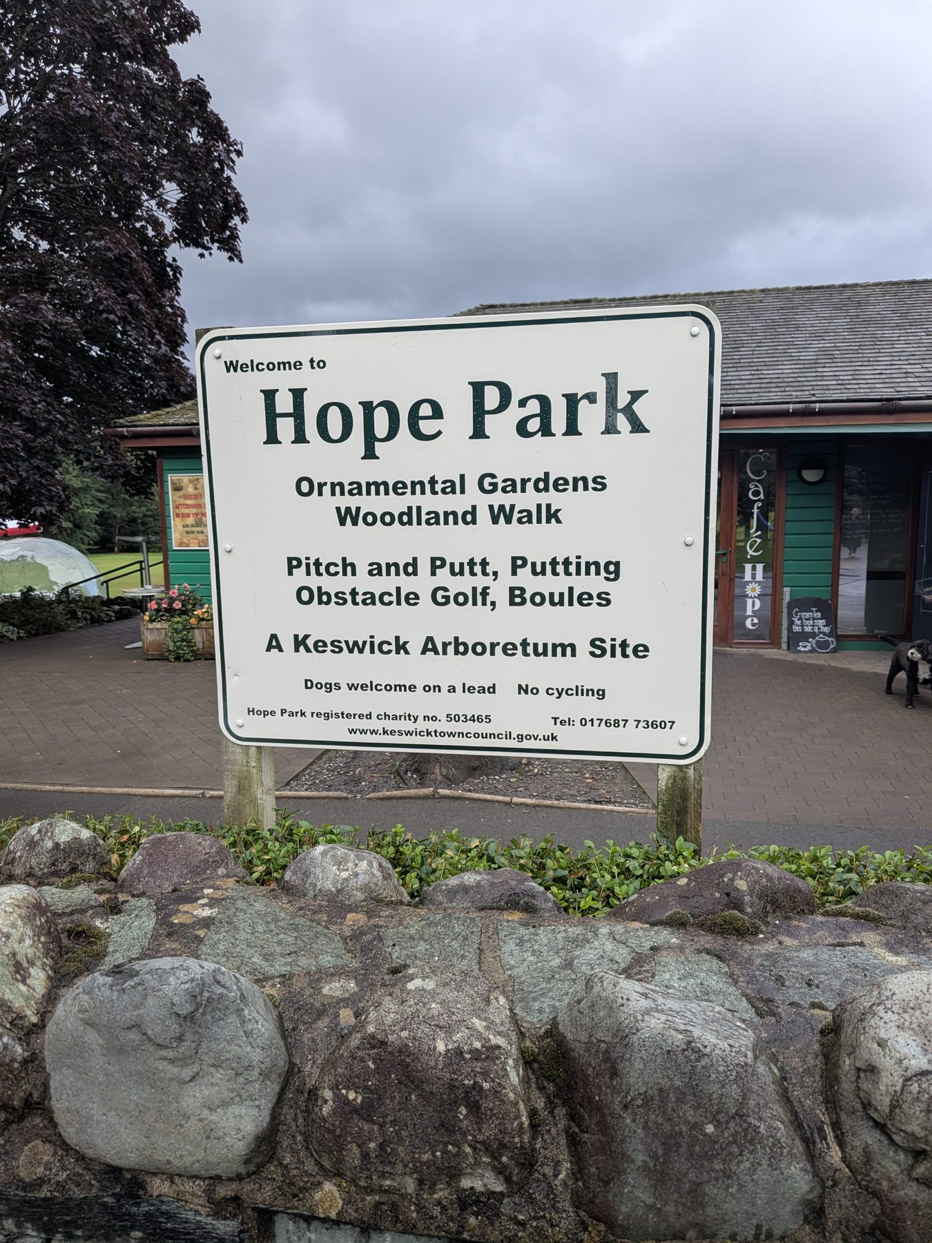 The entrance sign at Hope Park, Keswick, listing the gardens, games and facilities