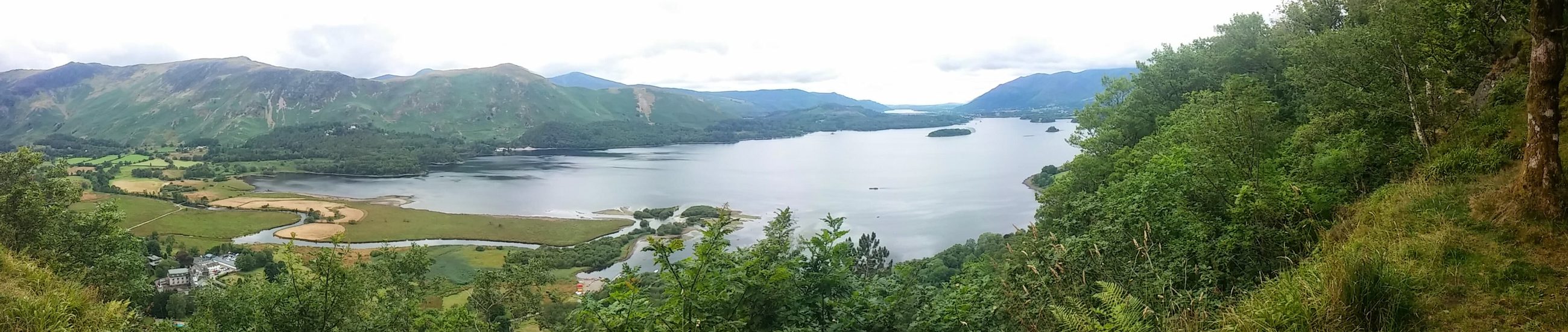 A wide panorama of Derwentwater and the north-western fells from the viewpoint above its eastern shore