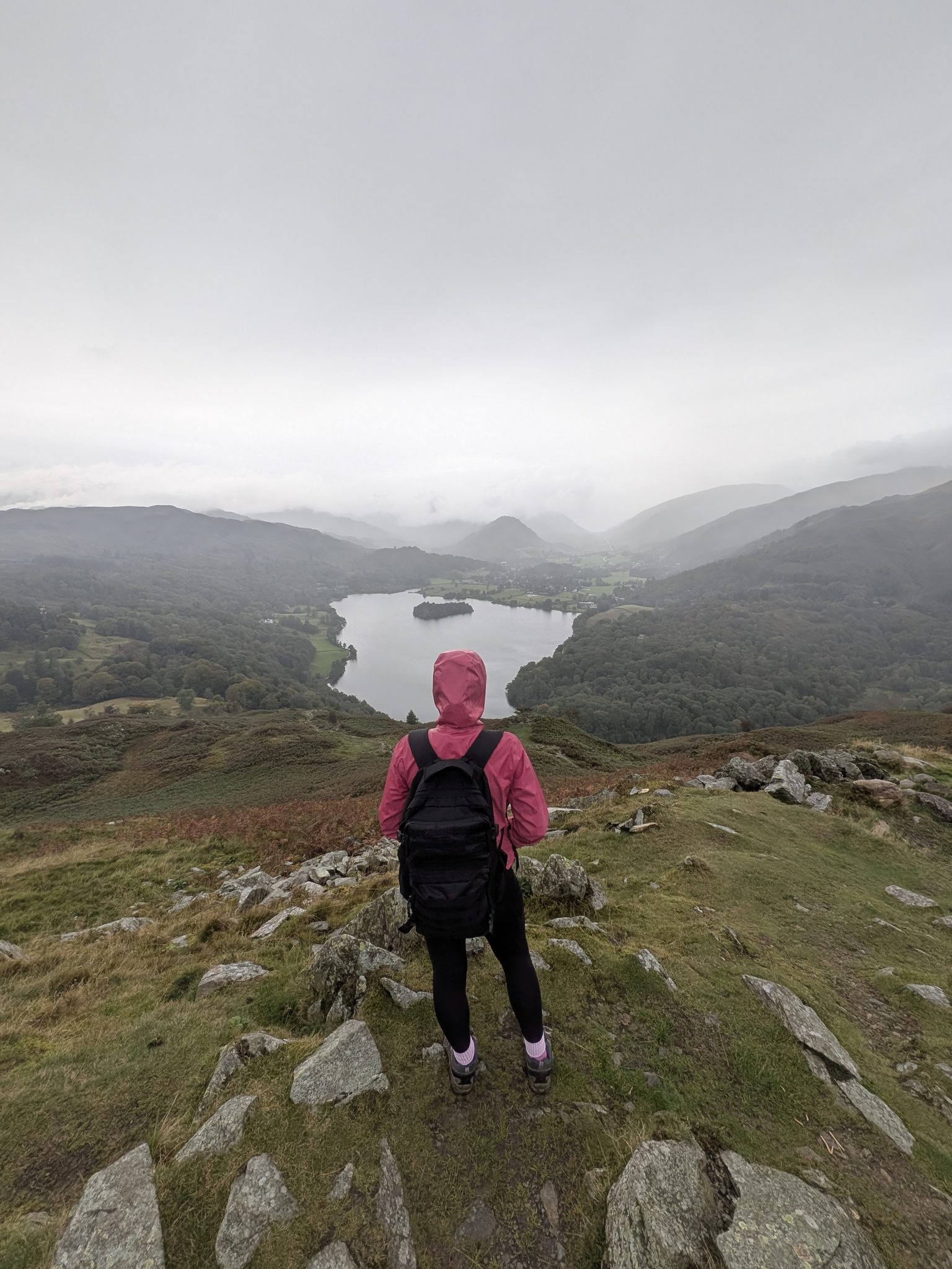 Ellie looking over Grasmere from the north side of Loughrigg Fell on the way down