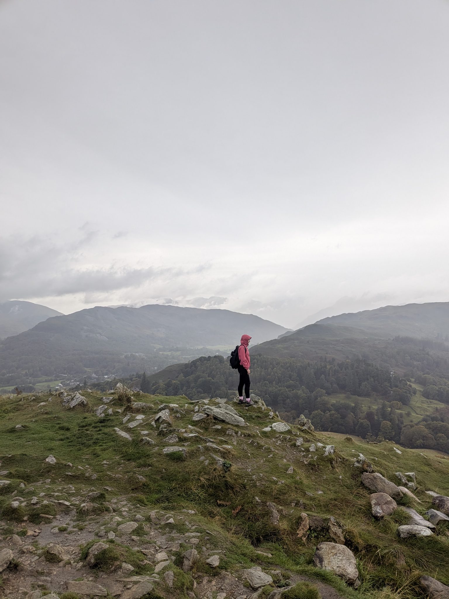 Ellie on the rocks above Grasmere on Loughrigg Fell