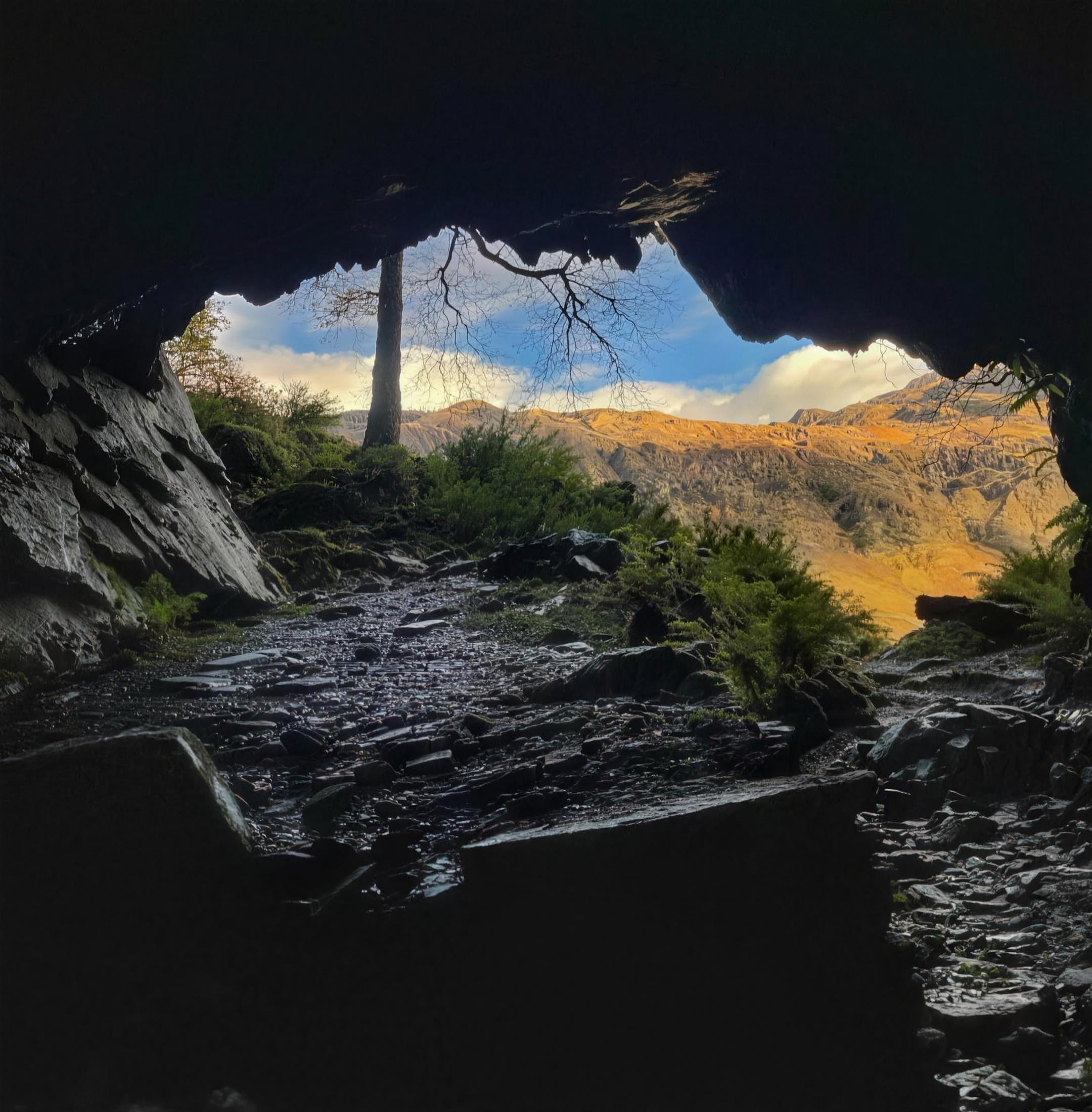 Millican Dalton's Cave, a former slate-quarry cave on Castle Crag in Borrowdale, Lake District