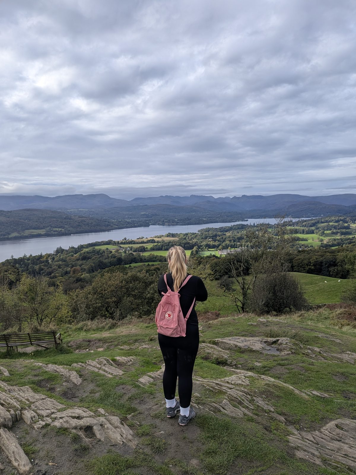 Maddie looking out over Windermere and the fells from the top of Orrest Head