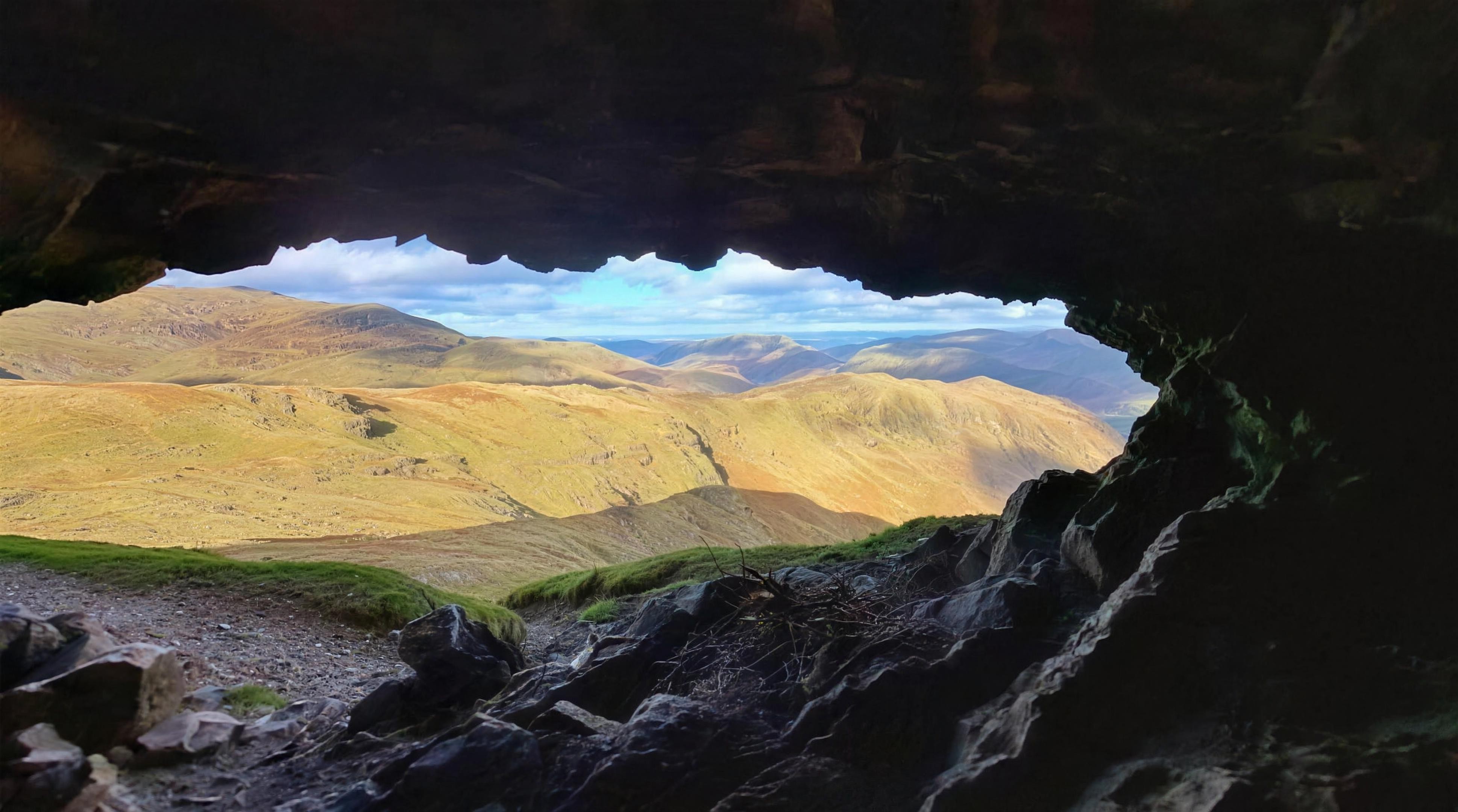 The Priest's Hole bivvy cave high on Dove Crag near Patterdale, Lake District