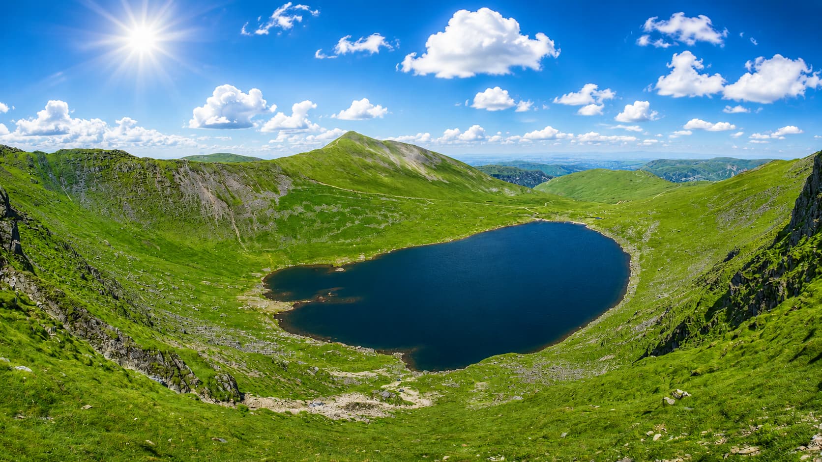 Red Tarn beneath Striding Edge and Helvellyn, a high and exposed wild camping spot for the experienced