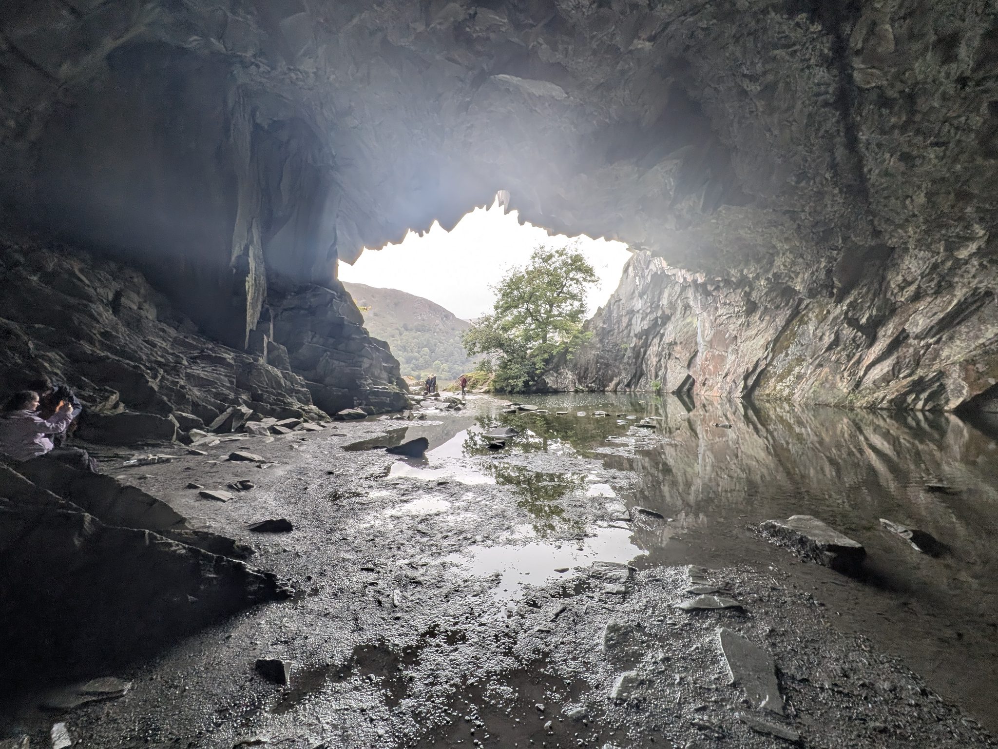 The roof of Rydal Cave reflected in the pool inside