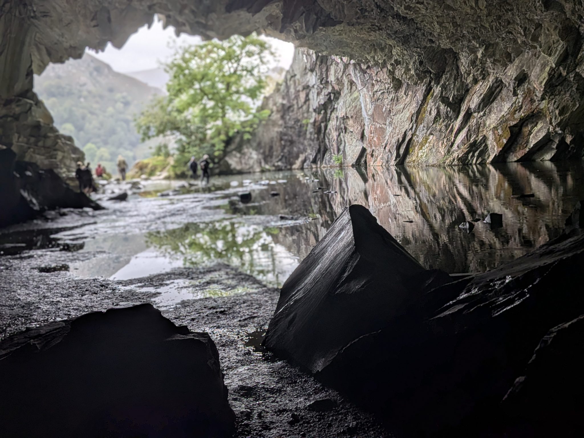 Inside Rydal Cave looking out to the entrance, showing the scale of the cavern