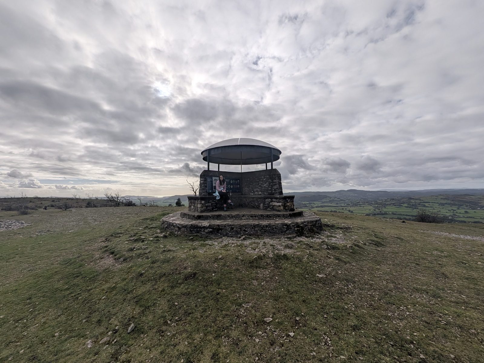Ellie at the Mushroom shelter on top of Scout Scar