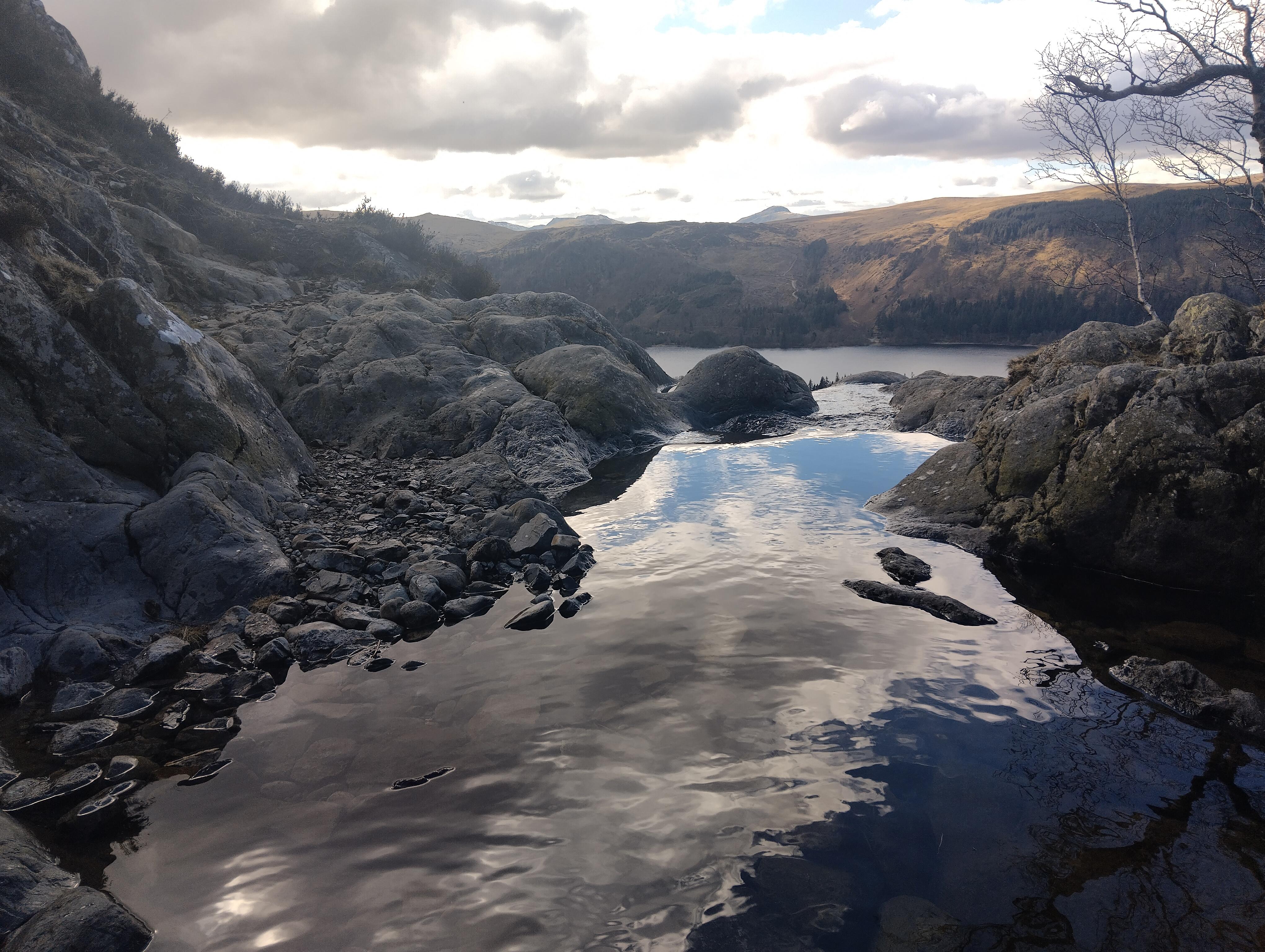 Natural rock infinity pool at Thirlmere with fell views, Lake District