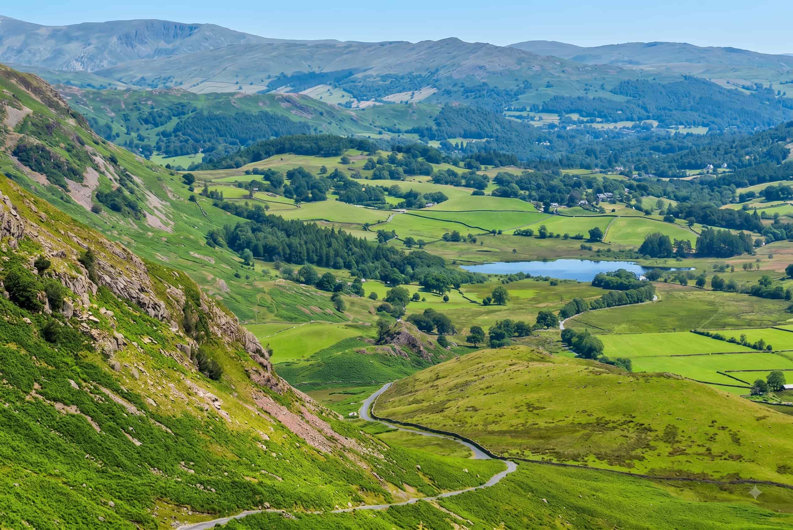 The single-track road snaking down from Wrynose Pass into Little Langdale, Lake District